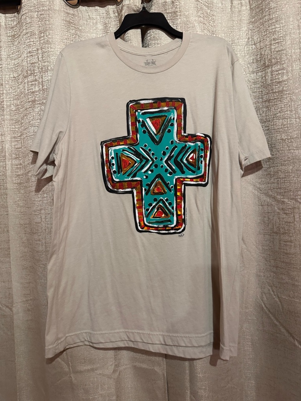 Beige Short-Sleeve Tee with Turquoise Tribal Cross Graphic